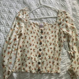 smocked button front long sleeve top